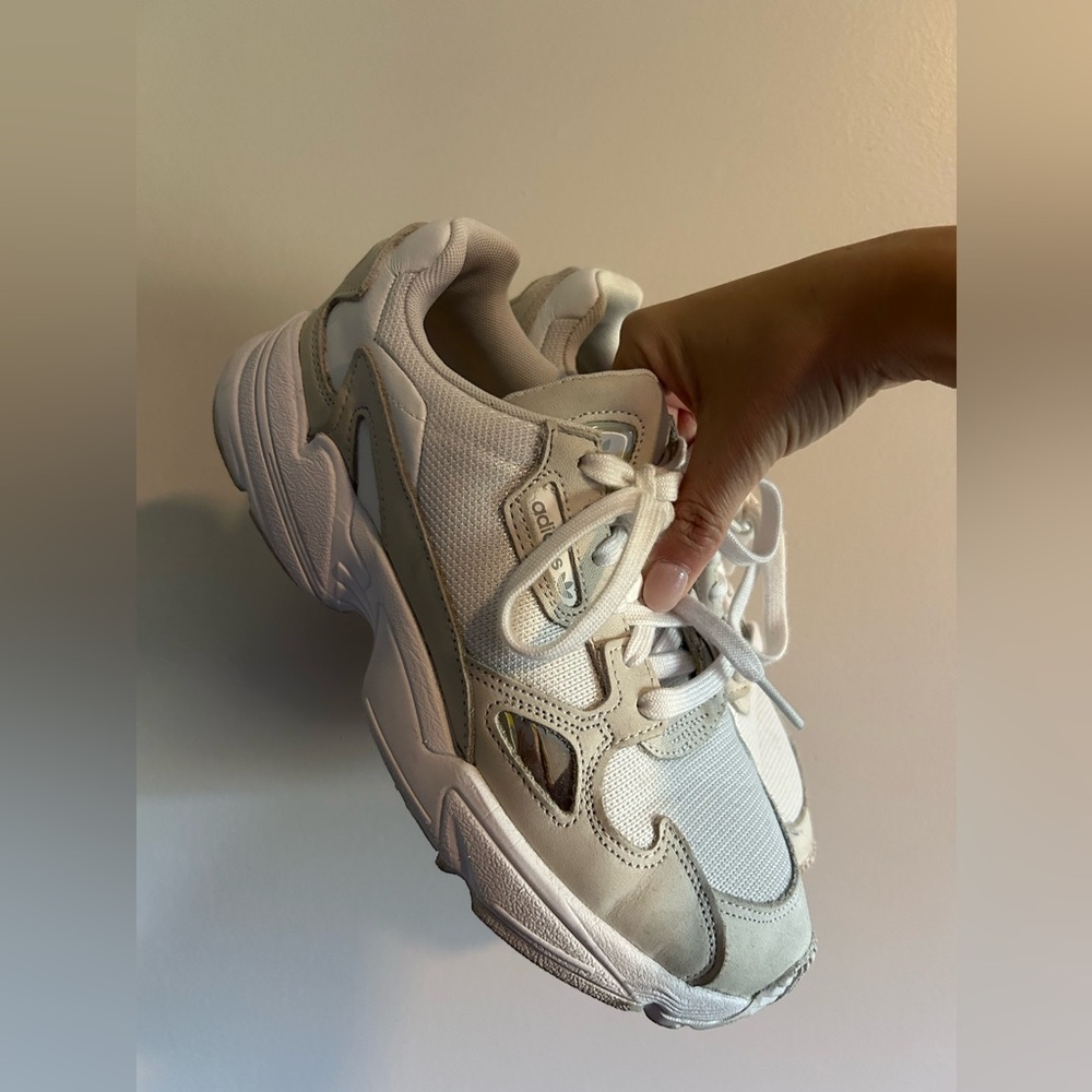 Adidas sneakers/tennis shoes.